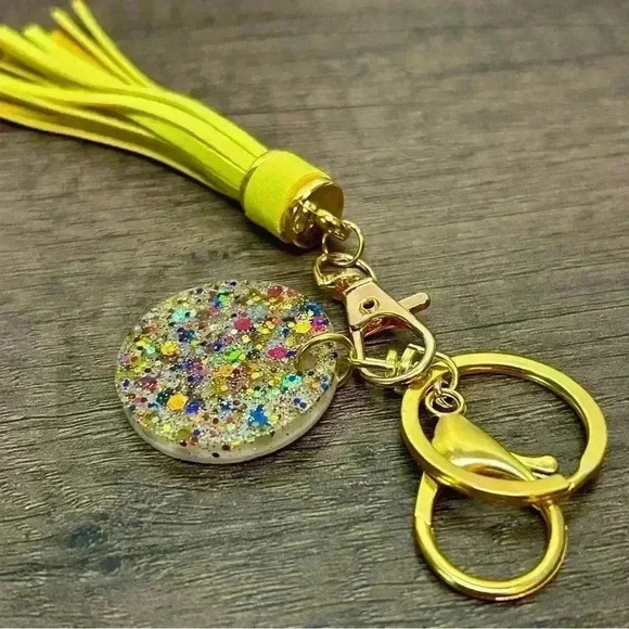 Gold Tone Keychain with Hand Crafted Sparkles Amulet and Yellow Tassel - Picture 2 of 2